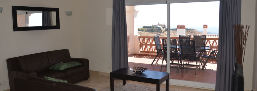 Contemporary furnishings and large balcony